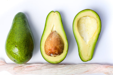 Avocado slices on white background isolated