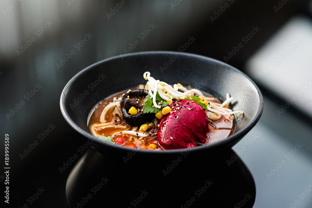 Wall mural bowl of ramen. traditional fast food meal of japanese chinese and korean cuisine. tasty noodle soup