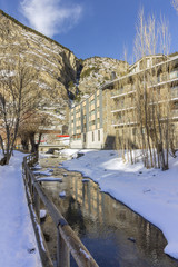 Winter pyrenes landscape near Village of Canillo, trekking and cycling trail. Andorra.