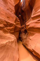 Small Path through Upper Antelope Canyon. Natural rock formation in beautiful colors. Beautiful wide angle view of amazing sandstone formations. Near Page at Lake Powell, Arizona, USA