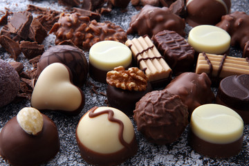a lot of variety chocolate pralines, belgian confectionery gourmet chocolate