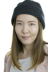 Young woman with winter hat isolated on white background