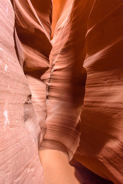 Small Path through Upper Antelope Canyon. Natural rock formation in beautiful colors. Beautiful wide angle view of amazing sandstone formations. Near Page at Lake Powell, Arizona, USA