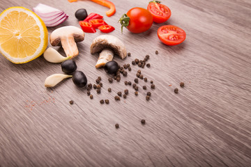 Healthy food background / studio photo of different fruits and vegetables on wooden table. Copy space. High resolution product
