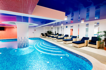Private swimming pool for relaxation, with beautiful lighting.