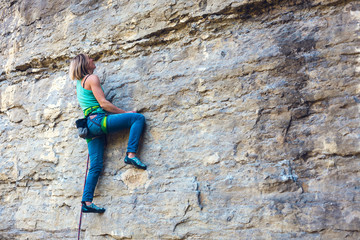 rock climber on a rock.