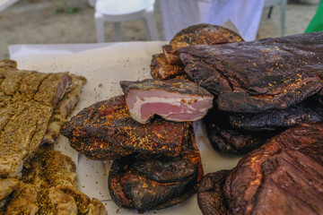Chiromeri, meat declicay of smoked pork on display.