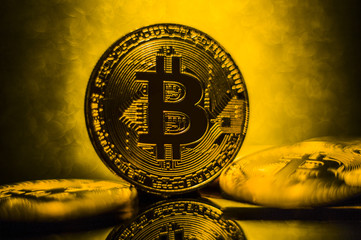 Coins golden  bitcoin of the black background