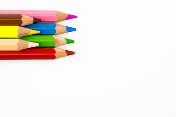 A group of colored pencils