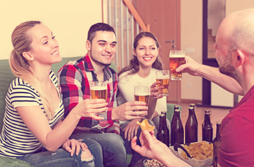 Couples hanging out with beer