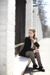 Fototapeta premium Cute girl in an autumn park