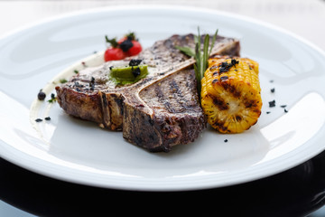 T bone steak. Grilled mexican style meat. Juicy tender pork chop. Simple tasty meal