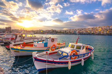 The pictursque port of Sitia, Crete, Greece at sunset. Sitia is a traditional town at the east...