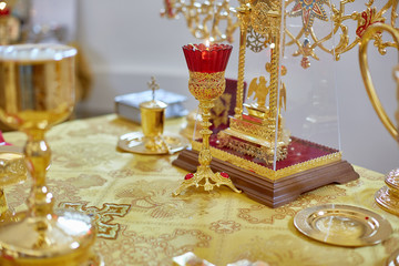 Fototapeta premium Golden religious utensils. Details in the Orthodox Christian Church. Russia.