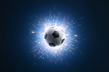 Fototapeta premium Soccer ball. Soccer background with fire sparks in action on the black. Soccer