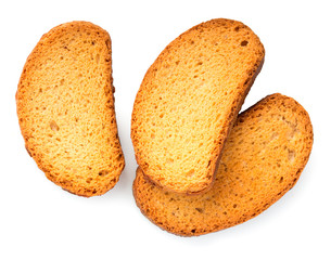 Crispy rusks isolated on white background, close up, top view.