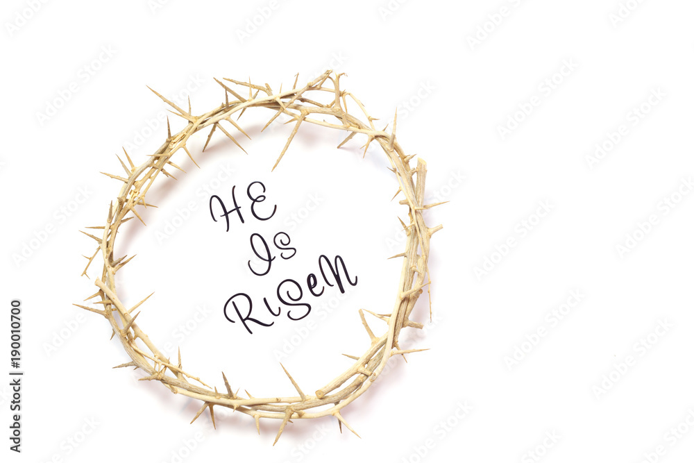 Wall mural easter he is risen quote isolated on white background with crown of thorns