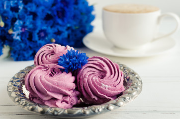 Zephyr with cup of cappuccino coffee