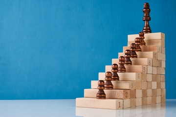 Wooden chess with wood stair - obrazy, fototapety, plakaty