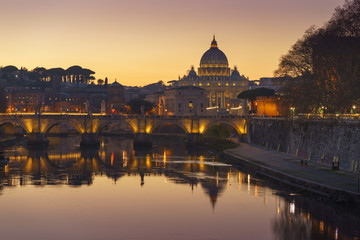 Fototapeta na wymiar Rome Vatican St.peter basilica after sunset view of river Tiber and Saint Angelo bridge