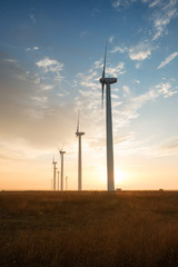 Obraz premium Sunrise at the wind park