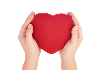female hands holding bright red heart on white background top view