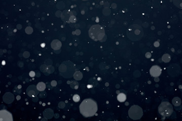 Fototapeta na wymiar Snowfall on black background - design element