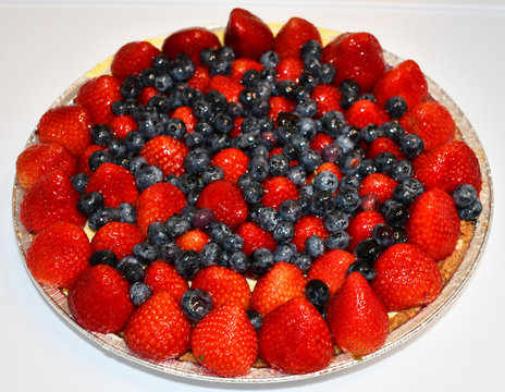 Fruit tart with strawberries and blueberries