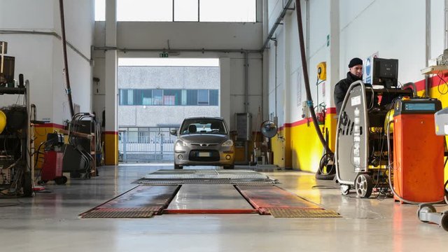 time lapse of a revision of a car in an authorized mechanical workshop
