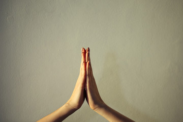 close up Female hands together close-up, gesture namaste, yoga, praying. - obrazy, fototapety, plakaty