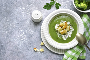 Obraz na płótnie Canvas Broccoli pureed soup with croutons.Top view.