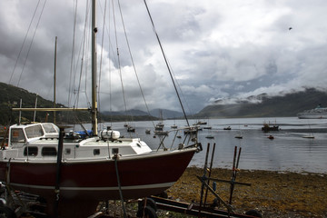 Ullapool harbour in Scottish Highlands in cloudy day. Scotland, United Kingdom.