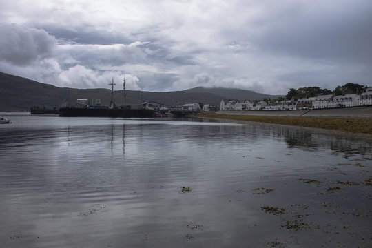 Ullapool harbour in Scottish Highlands in cloudy day. Scotland, United Kingdom.