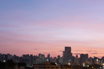 Fototapeta na wymiar Red sunset sky over the city