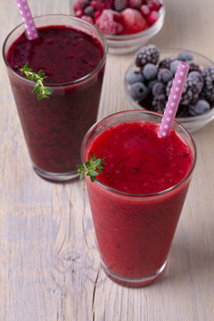 Berry smoothie, garnished with thyme
