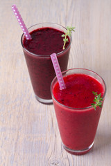 Berry smoothie, garnished with thyme