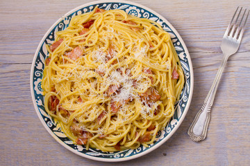Pasta carbonara. Creamy Spaghetti Carbonara. Italian cuisine dish. View from above, top, horizontal