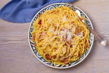 Pasta carbonara. Creamy Spaghetti Carbonara. Italian cuisine dish. View from above, top, horizontal