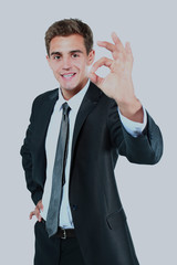 Business man shows well done against different backgrounds.