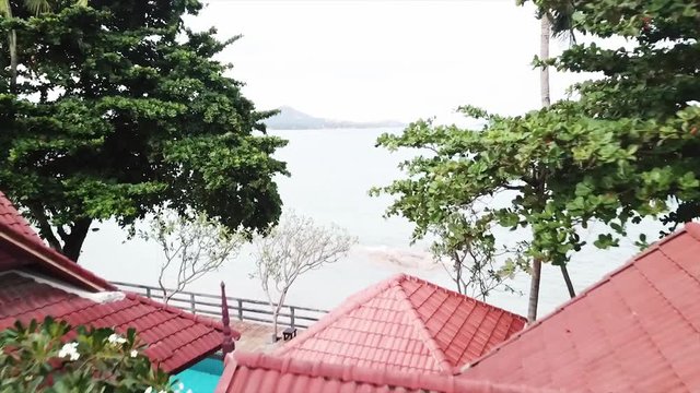 Aerial of Beautiful Fisherman Village and Pier, Top View. Video. Top view of a tropical village by the sea