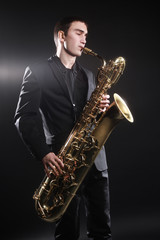 Naklejka premium Saxophone player Jazz musician saxophonist