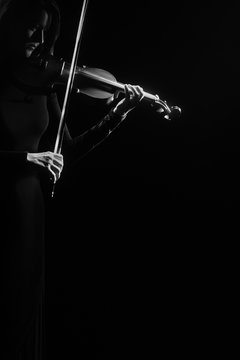 Violin player violinist playing isolated on black