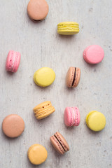 Macaron from above. Macarons are small round delicious french confections, made with meringue and sweet flavored filling. Often found in french bakeries, these tasty treats are light & crisp!