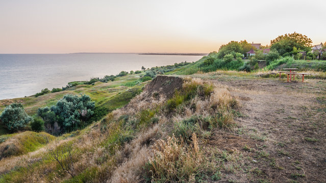 The shore of Taganrog Bay in the Rostov region in the rays of the setting sun