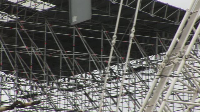 Metal scaffolding and building towers at construction site. Special device.