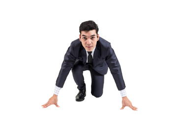 Businessman ready to run isolated on white background