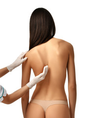 Doctor research patient spine scoliosis deformity backache make massage 