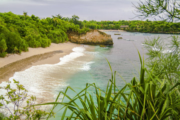 Tropical Balinese Beach. Pristine water, golden sandy beach, sparsely populated, all describe Nusa Lembongan, a short boat ride off the southern coast of the Bali mainland.