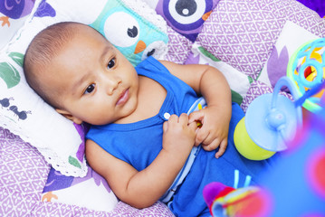 Happy Baby Boy Playing With Baby Play Gym