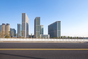Fototapeta na wymiar modern buildings near road in modern city
